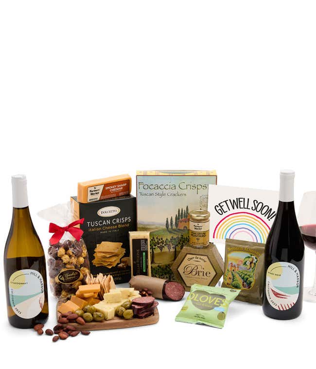 An abundant gift box filled with California Pinot Noir and Chardonnay, assorted crackers, three cheeses, summer sausage, and snacks with a Get Well Card. 