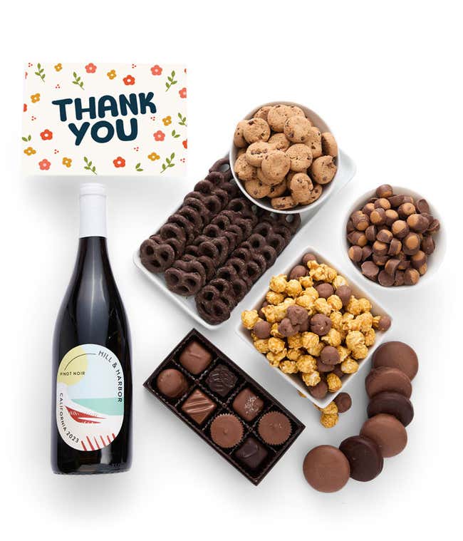 A gift set featuring a bottle of California Pinot Noir with chocolate pretzels, caramel popcorn, mini cookies, chocolate peanut butter buckeyes, chocolate-covered Oreos, assorted chocolates and a Thank You card to show your appreciation.